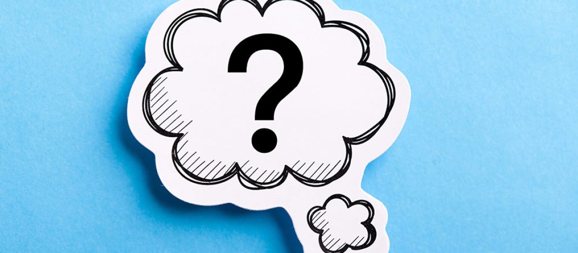 Question Mark speech bubble isolated on blue background.